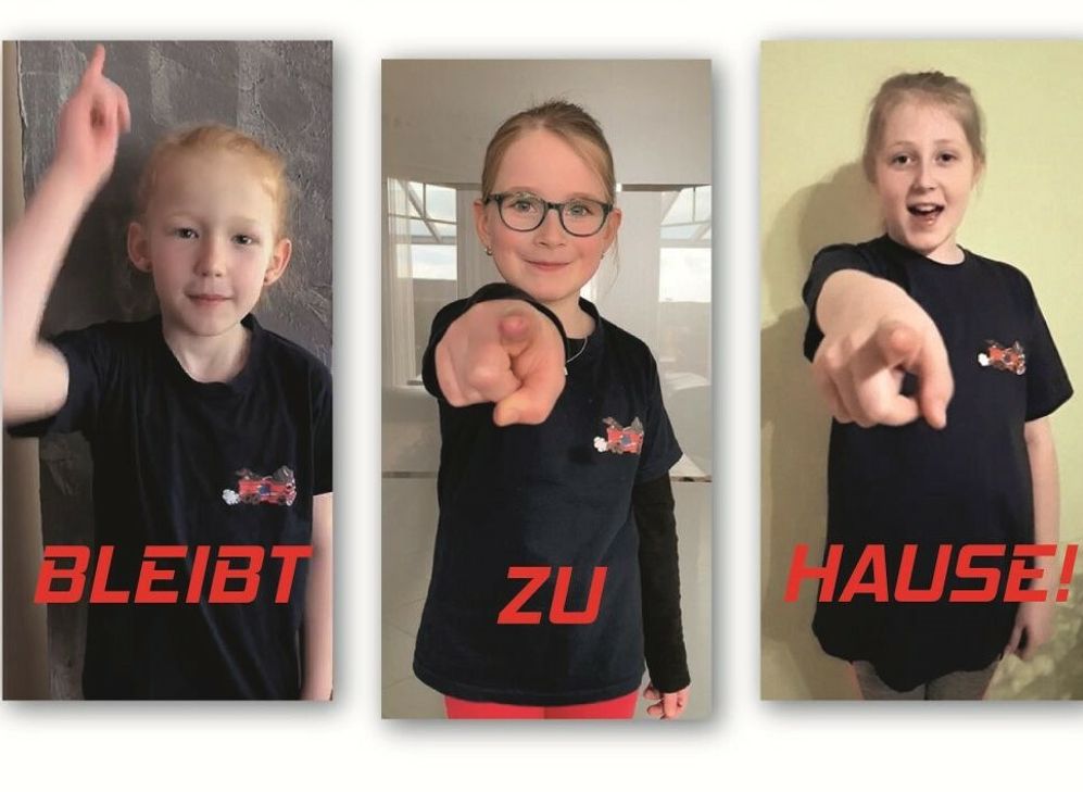 Die Botschaft der Kinder der Bambini-Feuerwehr ist klar: Bleibt während der Corona-Pandemie zu Hause.