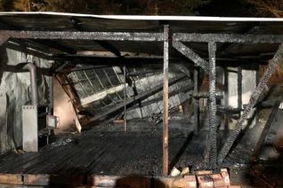 Die ausgebrannte Gartenhütte in Windesheim an der Nahe.  Foto: Polizei Rheinland-Pfalz