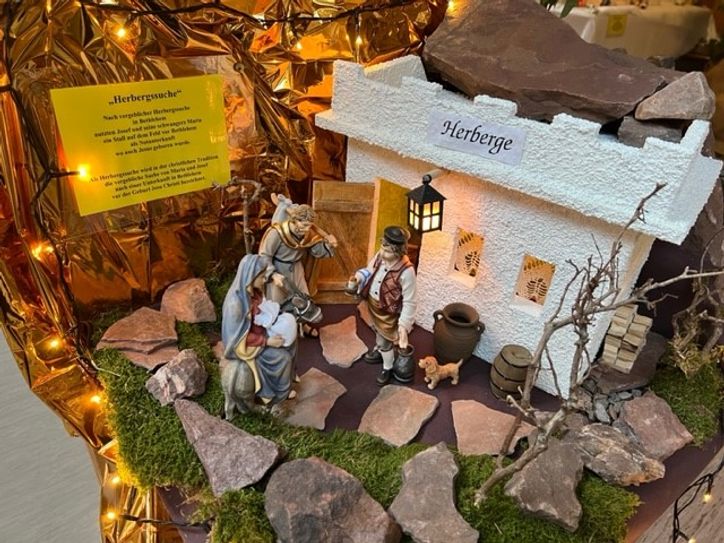 Die Suche nach einer Herberge - eine Darstellung aus der biblischen Weihnachtsgeschichte.