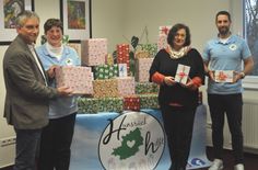 Von links: Dr. Jens Werner (Caritasdirektor), Gudrun Ströher („Hunsrück hilft“, Vorstandsmitglied), Ilona Besha (stellvertretende Caritasdirektorin) und Hendrik Gölzer („Hunsrück hilft“, Vorsitzender) bei der Spendenübergabe.