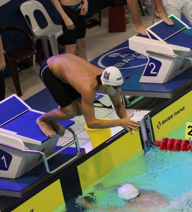 Kimi Kasper beim Staffelwechsel der 4X100m Lagen Staffel