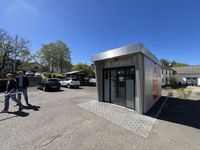 Der bestehende Geldautomat wird in ein Gesamtkonzept eingebunden.