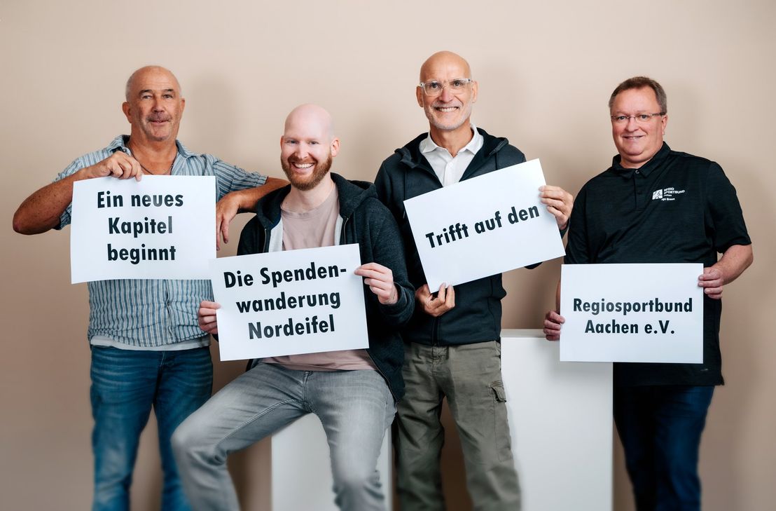 Bernhard Pauls (Blumen Pauls), Christopher Albrecht (Gemeinde Roetgen), Hugo Polz (Geschäftsführer Regiosportbund Aachen e.V.), Ingo Braun (Vizepräsident Regiosportbund Aachen e.V.) freuen sich auf die Spendenwanderung 2026.