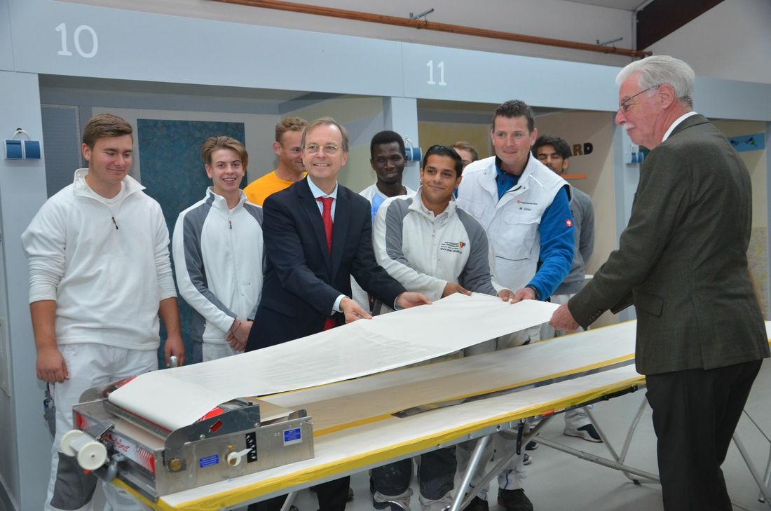 ...und bei den Malern von der praktischen Arbeit am Bildungszentrum in Simmerath. Foto: T. Förster