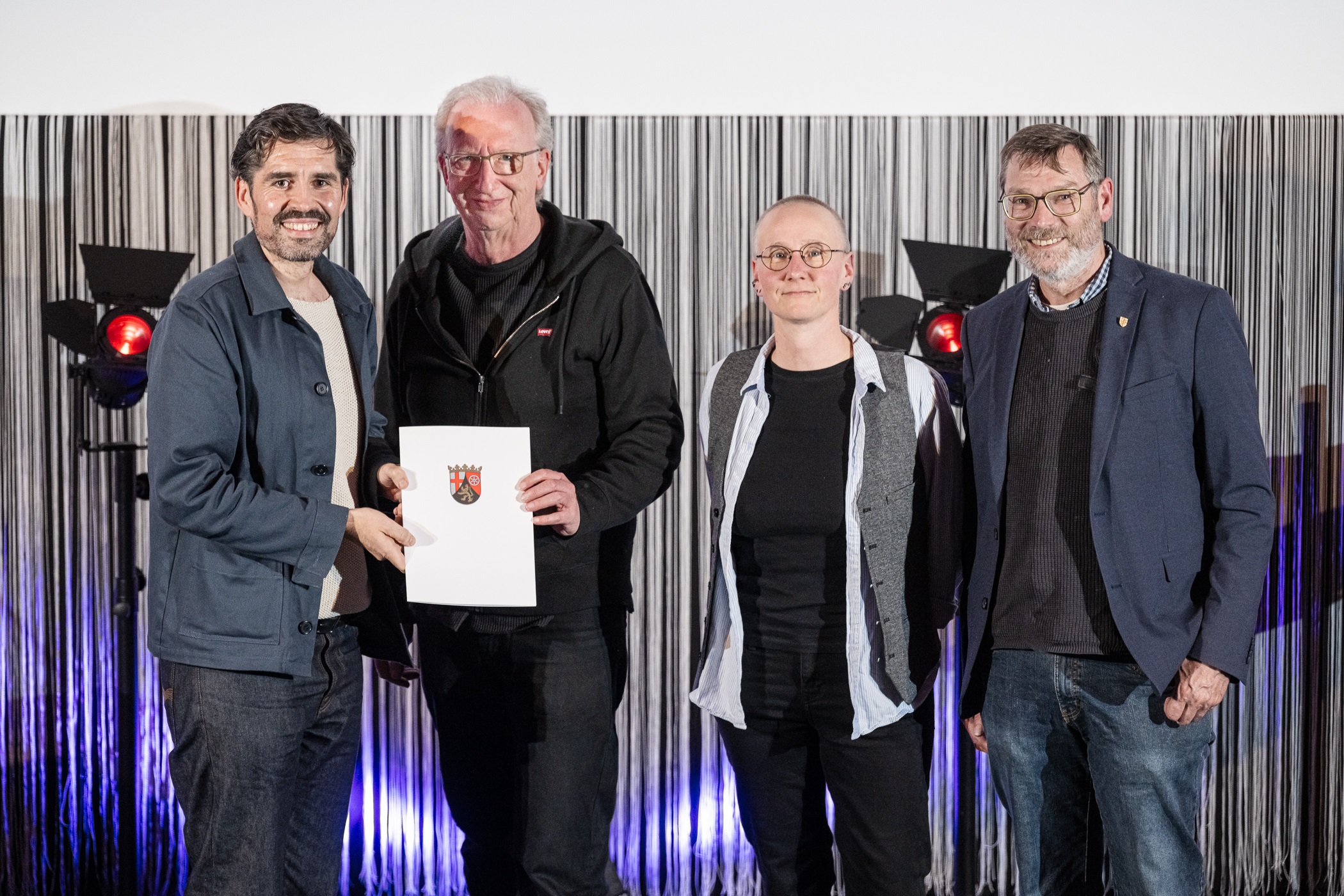 V.l.: Kulturminister Sven Teuber, Thomas Schneckenburger, Friederike Mühlhäusler und Thomas Schroeder.