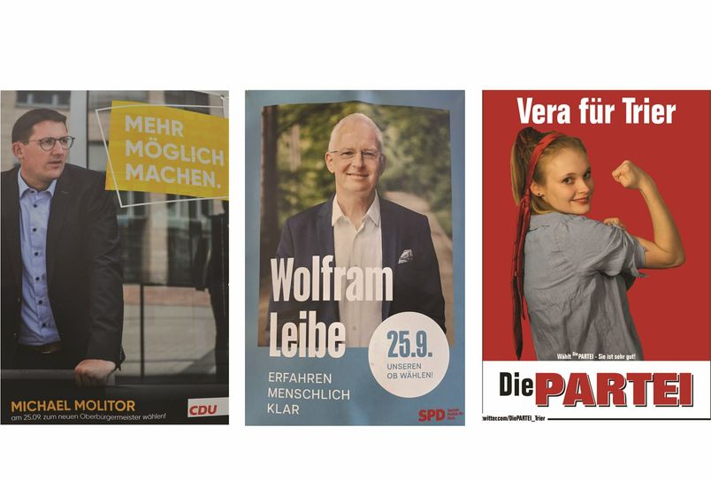 Plakate der drei Kandidaten