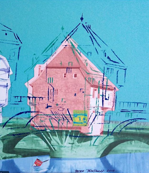 Peter Trautmann versteigert Brückenhaus-Bilder auf dem Nikolausmarkt. Den Gewinn stiftet er der Stadt zur Rettung des Brückenhauses in Bad Kreuznach.